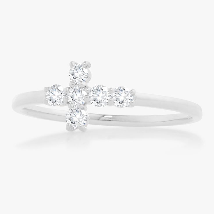 Our Little Grace Diamond Cross Ring is a twinkling token of faith. The intentional delicacy of this design makes for the heartfelt gift of a child's first piece of fine jewelry or an adult's everyday dainty wear. Metal: 18k White Gold / 18k Yellow Gold / 18k Rose Gold 6 Round Brilliant Cut Natural Diamonds: Approx. 0.24 ctw G/H Color and SI1-2 Clarity Diamonds Dainty White Brilliant Cut Stackable Rings, White Brilliant Cut Dainty Stackable Rings, Dainty White Stackable Rings With Brilliant Cut, White Sterling Silver Stackable Rings With Prong Setting, Dainty White Sterling Silver Diamond Ring, White Sterling Silver Stackable Rings With Brilliant Cut, College Rings, Mens Engagement, Diamond Cross