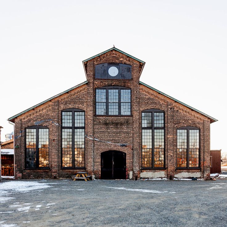 an old brick building with lots of windows