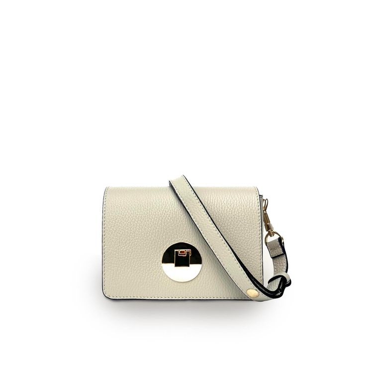 This elegant crossbody bag is perfect for all occasions, taking you stylishly from day to night. Made in Italy from supple grained pebble leather, the handbag is fully lined and features gold hardware with a statement gold clasp closure.  The adjustable smart strap can be shortened for a shoulder bag or lengthened for an elegant crossbody.  This classic handbag will easily accommodate your essentials such as a purse, keys, mobile phone and cosmetics.  The stylish bag is delivered in a branded dust bag and includes a detachable and fully adjustable strap in co-ordinating leather.  A convertible shoulder bag to Crossbody bag made in Italy. 100% leather. Clasp closure. Wipe clean with damp cloth Chic Beige Pebbled Leather Bag, Elegant Pebbled Leather Shoulder Bag With Metal Hardware, Elegant Pebbled Leather Satchel With Adjustable Strap, Elegant Satchel With Adjustable Strap In Pebbled Leather, Chic Shoulder Bag With Metal Hardware And Pebbled Leather, Beige Pebbled Leather Bag With Gold-tone Hardware, Beige Pebbled Leather Shoulder Bag With Gold-tone Hardware, Elegant Pebbled Leather Bag With Adjustable Strap, Chic Pebbled Leather Crossbody Bag