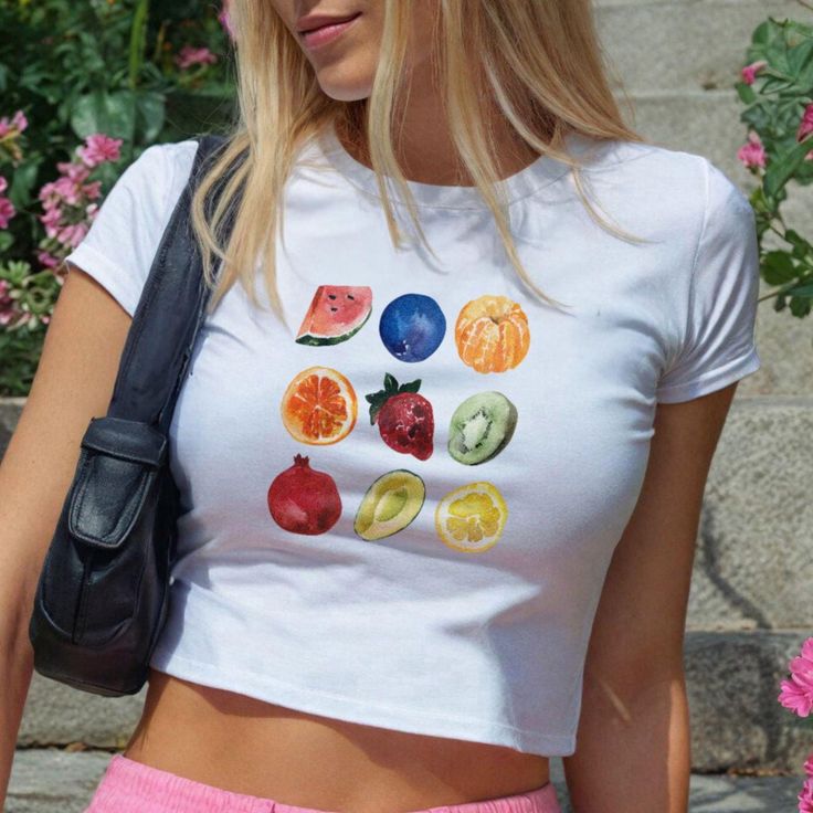 Fruit Salad 90s Baby Tee, T-shirt 90s Aesthetic Vintage Tee Trending Y2K Print Top * 90's Inspired baby tee style (made for adults) * 100% cotton * Easy tear-away label * Y2K Vintage Streetwear Trending Fashion * Environmentally sustainable made-to-order system The '90s-inspired baby features a soft, stretchy fabric, offering a snug, comfortable, and figure-flattering fit. Featuring a vibrant graphic print, this baby tee embodies the playful and youthful style of the 90's and Y2K eras. Ideal for 90s Inspired Summer T-shirt With Letter Print, Y2k Style Short Sleeve T-shirt With Fruit Print, 90s Inspired Graphic Print T-shirt For Summer, Casual Printed Fitted T-shirt, Casual Fitted Printed T-shirt, 90s Style Printed T-shirt For Streetwear, Y2k Printed Crew Neck T-shirt, Trendy Fitted Fruit Print Top, Fitted Y2k T-shirt For Summer