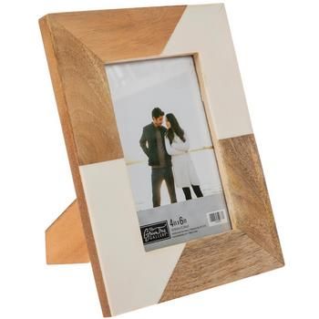 a wooden frame with an image of two people