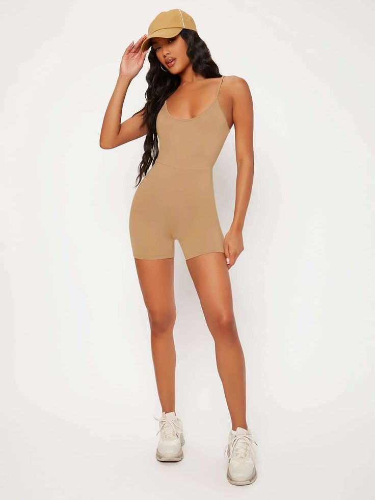 Looking for a stylish and comfortable outfit for your next workout session or casual hangout? Look no further than this Cami Unitard Romper! With its spaghetti strap neckline, a sleeveless design, and short length, it's perfect for staying cool and comfortable. Made from a medium-stretch fabric that moves with you, this romper is both practical and fashionable. Specifications: Neckline: Spaghetti Strap Pattern Type: Plain Sleeve Length: Sleeveless Length: Short Fabric: Medium Stretch Material: F Comfortable Outfit, Galaxy Print, Workout Session, Fabric Suppliers, Fabric Medium, Comfortable Outfits, Round Neckline, Stretch Fabric, Knitted Fabric