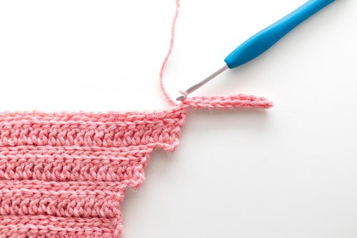 the crochet stitch is being worked on