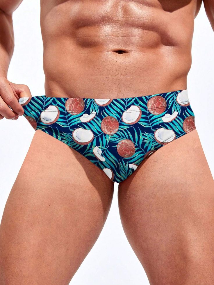 Escape to paradise with our Tropical Print Swim Brief. Embodying the spirit of a tropical getaway, this swim brief features a vibrant and exotic print that transports you to sun-soaked beaches and palm-fringed shores. Made from high-quality, quick-drying fabric, it offers a comfortable and flexible fit for all-day wear. Features: Pattern Type: Fruit & Vegetable Type: Briefs Fabric: Medium Stretch Material: Fabric Care Instructions: Hand wash or professionally dry clean Size Chart ( Inches ): Siz Multicolor Palm Tree Print Swimwear For Poolside, Vacation Swimwear With Palm Tree Print, Multicolor Hawaiian Swimwear With Palm Tree Print, Hawaiian Surfing Swimwear For Vacation, Hawaiian Swimwear For Surfing Vacation, Tropical Surfing Swimwear For Vacation, Tropical Swimwear For Surfing Vacation, Tropical Swimwear For Surfing On Vacation, Tropical Style Swim Trunks With Tropical Print