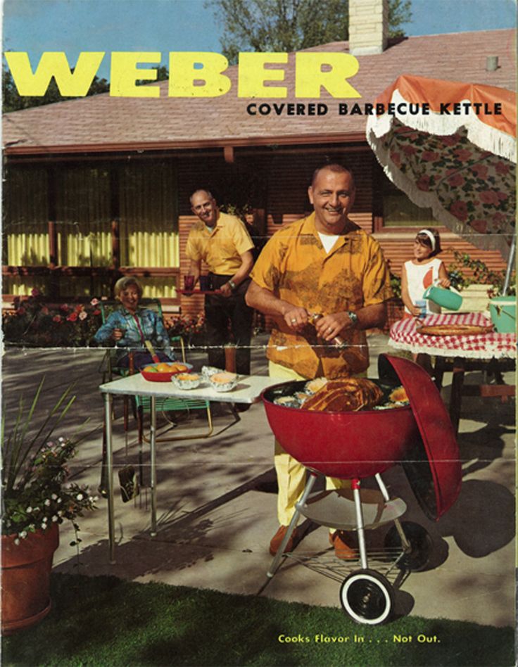 a man grilling meat on top of a red bbq