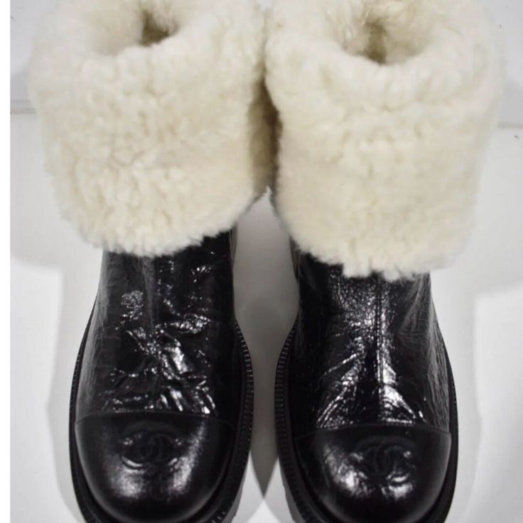 Chanel Authentic Limited Edition Shearling Leather Boots Size 38.5 Worn Once Brand New Condition No Box Only Dust Bags. High Gloss Lambskin Leather Sheepskin Boots With Faux Fur Trim And Round Toe, Luxury Winter Boots With Faux Fur Trim, Luxury Leather Boots With Faux Fur Lining, Winter Shearling Boots With Leather Sole, Luxury Boots With Faux Fur Lining, Winter Calf Leather Boots With Round Toe, Luxury Sheepskin Round Toe Boots, Black Shearling Boots For Fall, Designer Winter Boots With Leather Sole