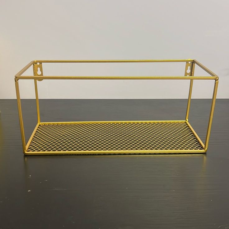 a yellow metal shelf sitting on top of a wooden floor