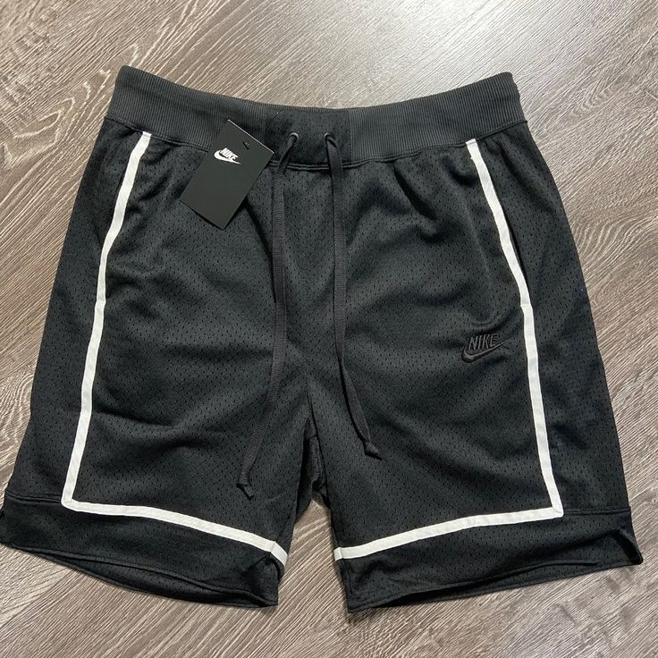 Nike Sportswear Statement Mesh Shorts Black White Mens Size M Ct5766-010 New Sporty Black Gym Bottoms, Nike Breathable Sportswear Bottoms, Nike Sporty Breathable Bottoms, Sporty Black Bottoms With Go-dry Feature, Black Sportswear Bottoms For Training, Casual Moisture-wicking Bottoms For Sports, Casual Moisture-wicking Bottoms For Sports Events, Breathable Black Shorts, Black Cotton Shorts For Sports Events