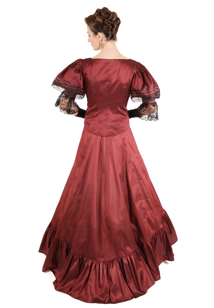 Catch the eyes of many donning the fashion of the Victorians! What a delight! The lovely 19th century styled jacket has front button closure. The poufed oversleeves are trimmed in lace as well as the undersleeves. The graceful skirt is finished with a wide flounce at the hem and can be worn as shown, with a train, or tied up to create bustle. Skirt has elastic waist. Dry clean. Polyester dupioni. Acetate underskirt. Poly lace trim. The model is wearing a crinoline, jewelry and gloves which are p Regency Style Victorian Lace Dress With Historical Design, Victorian Dress With Buttons For Costume, Lace Victorian Dress With Historical Design For Vintage Events, Elegant Victorian Dress With Lace And Historical Design, Elegant Victorian Lace Dress With Historical Design, Lace Victorian Dress For Vintage Events, Lace Victorian Dress With Ruffles For Formal Occasions, Formal Victorian Lace Dress With Ruffles, Formal Lace Victorian Dress With Ruffles