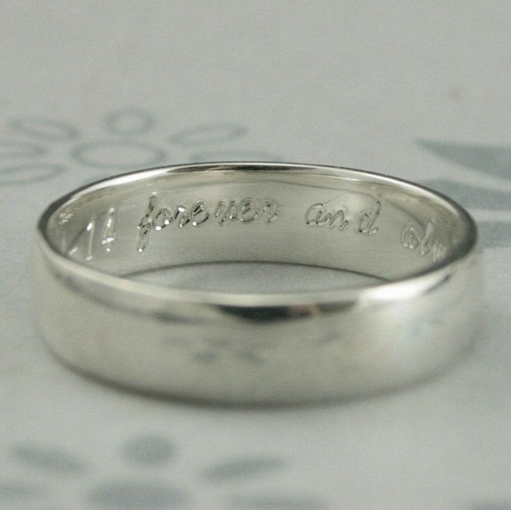 a wedding ring with the words you are on it