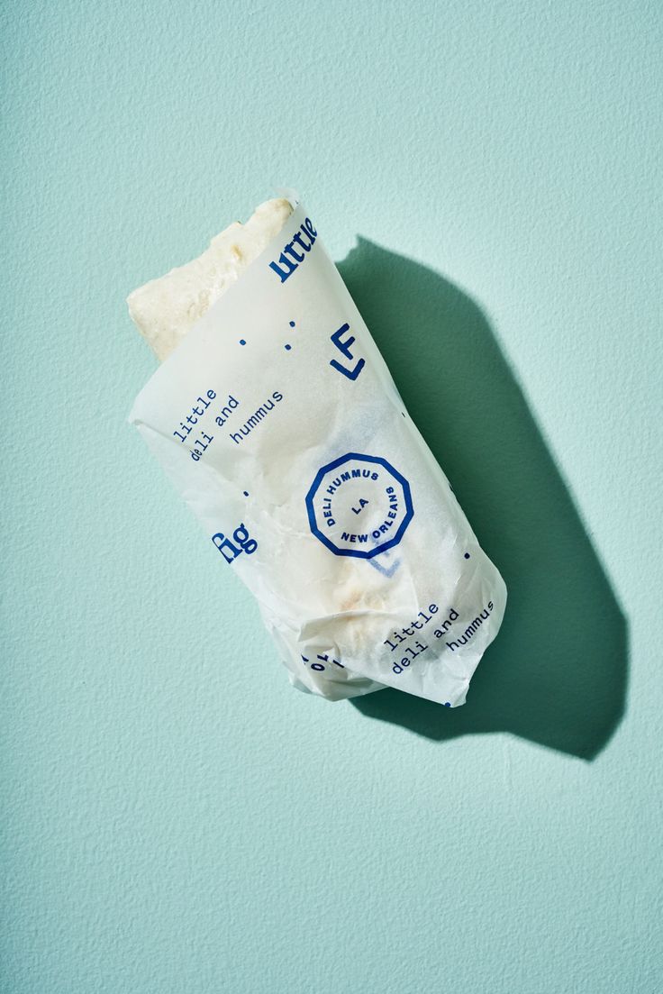 a piece of food sitting on top of a blue surface