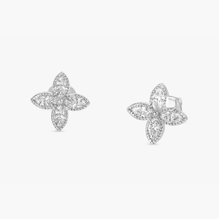 Leticia Embrace elegance and sophistication with the Diamond Marquise Clover Earrings. These stunning earrings feature a unique clover design crafted from solid 14k gold (available in yellow, white, and rose gold). Each petal sparkles with a marquise-cut diamond, adding a touch of vintage-inspired glamour to your look. Perfect for everyday wear or special occasions, these earrings are sure to become a treasured piece in your jewelry collection. - Handmade- Solid Gold- Natural Diamonds- Total Dia