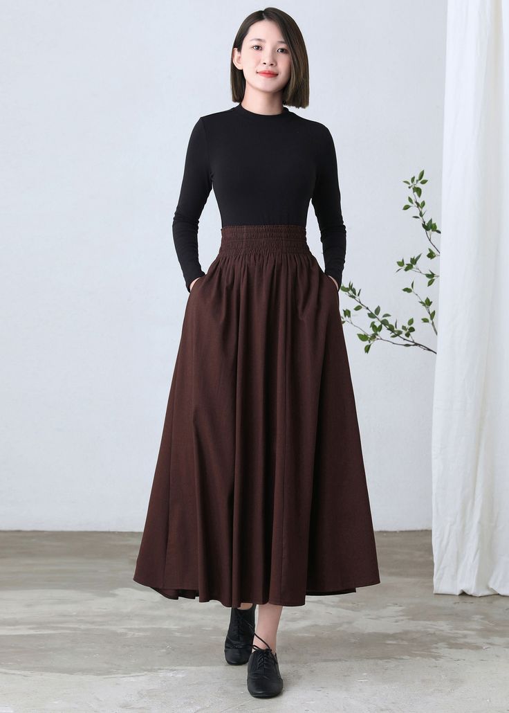 "★★ FEATURES * cotton linen skirt * with liner * Two side seam pockets * Wide elastic waistband * pleated waist detail * Plus size full skirt * A Line Skirt * Perfect for Spring Autumn * Wash by hand or machine with cold water ★★ The model is 170 cm (5′ 7″) tall with a 80 cm (31.5\") bust, 66 cm (26\") waist. She is wearing the brown linen skirt in size XS. ★★ Bespoke Order Service If you Request other color Request the length Your height is not between 155 cm- 172 cm Your weight is over 75 kg I Baggy Solid Skirt For Fall, High Waist Gathered Skirt For Fall, Fall Gathered Long Skirt, Fall Long Gathered Skirt, Baggy Long Skirt For Fall, Fall Cotton Gathered Maxi Skirt, Bohemian High Waist Skirt For Fall, High Waist Cotton Gathered Maxi Skirt, Fall Cotton Maxi Skirt With Gathered Detail