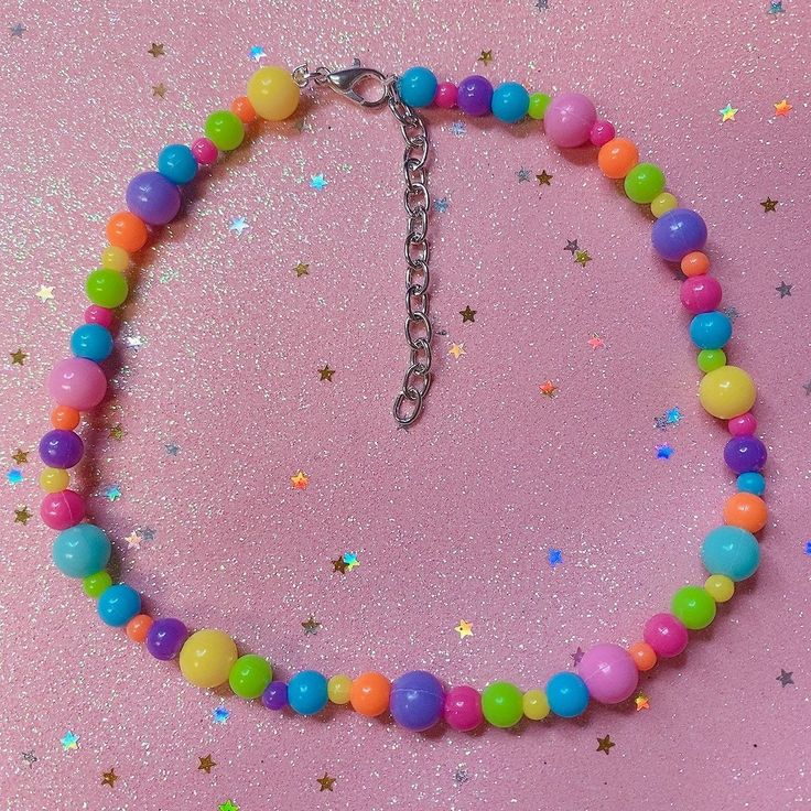 "💖 A colorful choker to match any bold playful looks! ☺️💕💖 14.5\" long, but feel free to DM about extensions! :)  Will ship out in 1-2 days! 💖 Check out my Depop for a larger choker selection! : D https://www.depop.com/jenniichii/" Trendy Multicolor Party Choker, Trendy Multicolor Choker For Party, Rainbow Adjustable Choker For Festival, Rainbow Adjustable Choker For Festivals, Fun Multicolor Beaded Necklaces For Parties, Multicolor Fun Beaded Necklaces For Party, Cute Multicolor Beaded Necklaces For Parties, Fun Multicolor Beaded Party Necklaces, Cute Multicolor Beaded Necklace For Festival