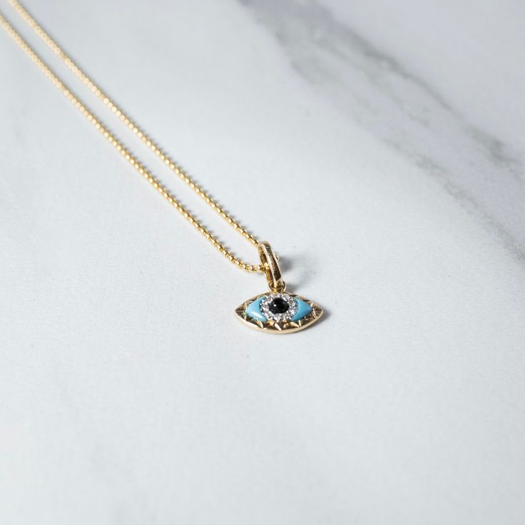 A charmed beauty - the Evil Eye has so many powerful meaning, especially our intricate charmed chain, a sure show stopper and a piece to last a lifetime. - Charm: 12mm Solid 14kt Gold Charm adorned with pave' diamond's, natural turquoise and obsidian stone. - Chain: 14/20 Gold Filled Talismans created to protect against the evil eye are also frequently called "evil eyes". Eyes Style, The Evil Eye, Obsidian Stone, Evil Eyes, Natural Turquoise, Gold Charm, Ball Chain, 14kt Gold, Pave Diamonds