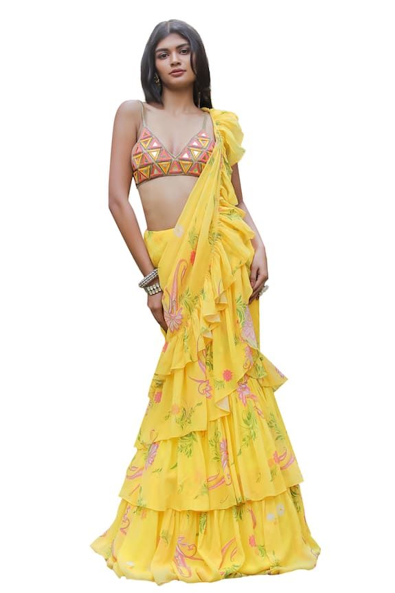 Yellow ruffle pre-draped saree with an attached cancan and floral print. Comes with a padded blouse with mirror and cowrie hand embroidery. - Aza Fashions Summer Bollywood Pre-draped Saree, Silk Lehenga With Traditional Drape For Summer, Traditional Silk Lehenga For Summer, Designer Wear Summer Blouse With Traditional Drape, Summer Georgette Sets With Ruffles, Summer Silk Choli For Reception, Summer Festive Pre-draped Saree With Ruffles, Summer Silk Pre-draped Saree For Reception, Sleeveless Georgette Saree With Floral Embroidery