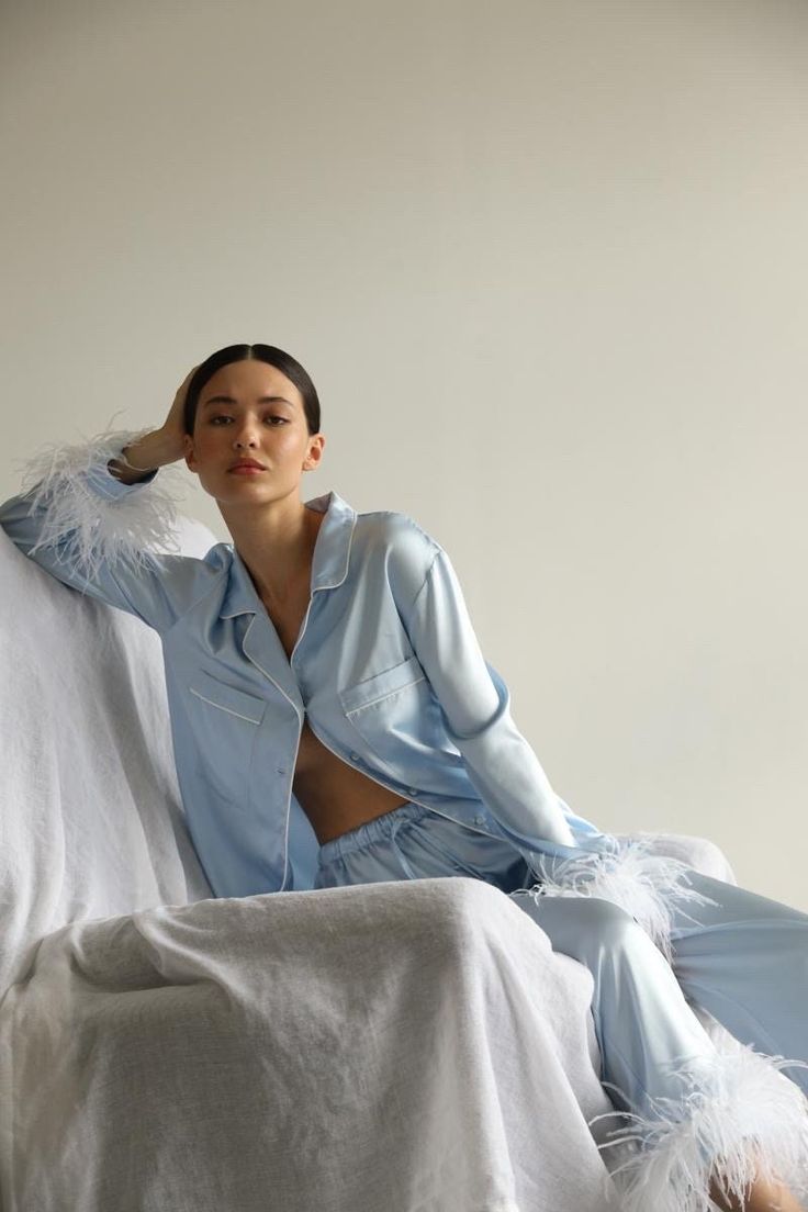 This pajama set is both lightweight and breathable, so you'll always look and feel great wearing our silky and cozy women's PJs. Silk's natural properties make this an excellent pajama set to wear all year around. In winter or summer, your silk PJs will regulate your body's temperature and keep you comfortable all night long. Our model wears size XS, her measurements are 84/64/89 cm and she is 168 cm tall. Detachable feathers  Composition- 97% pure silk, 3% elastane.  Care - dry clean. Winter Pjs Women, Bride Pajama Set, Luxury Pyjamas, Bridesmaid Pajama, Bridal Party Pajamas, Bride Pajama, Silk Pjs, Bridesmaid Pjs, Bridesmaid Pajama Set