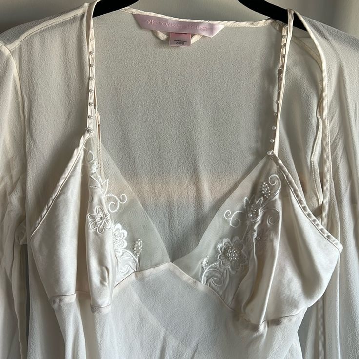 This Nightgown Was Used Once For About An Hour In 2001. Yes, 23 Years Ago. It Is In Perfect Condition. It Is 100% Silk. Beading/Design Is Beautiful. Fitted Sheer Nightgown With Long Sleeves, White Feminine Evening Sleepwear, Elegant Spring Sleepwear By Victoria's Secret, Sheer Evening Sleepwear For Spring, Spring Sheer Evening Sleepwear, Spring Evening Sheer Sleepwear, Silk V-neck Sleepwear For Evening, Feminine Silk Sleepwear For Evening, Feminine Silk Sleepwear For Wedding Night