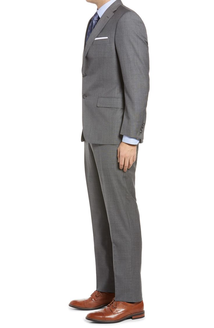 High-quality super 140s Italian wool elevates this handsome suit cut in a classic fit for versatile appeal. 100% wool Dry clean Made in Canada Timeless Custom Fit Business Casual Suits, Custom Fit Notch Lapel Suits For Business Casual, Elegant Notch Lapel Blazer For Business Trips, Slim Fit Suit With Pressed Crease For Business Casual, Classic Custom Fit Suits For Business Casual, Slim Fit Suits With Pressed Crease For Business Casual, Classic Single-breasted Suits For Business Trips, Timeless Three-piece Suit With Pressed Crease For Business Casual, Timeless Three-piece Suit With Pressed Creases