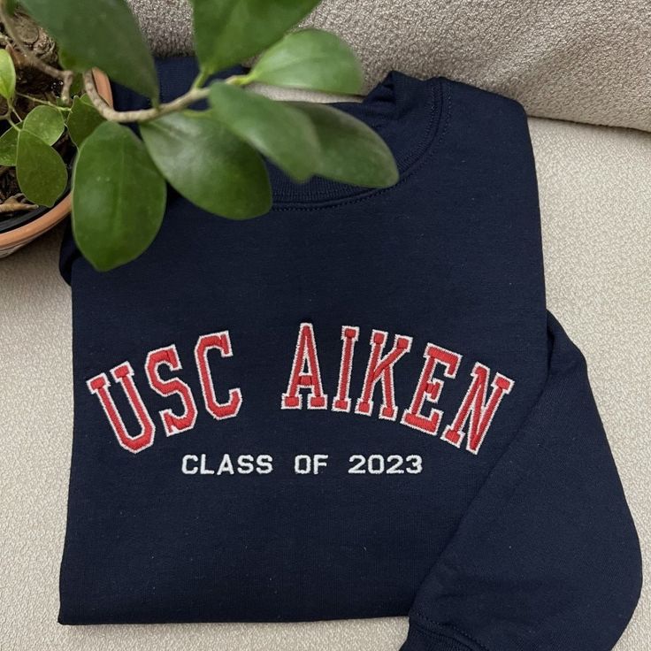 "If you want sleeve embroidery, add this add-on to your cart: https://customembshirts.etsy.com/listing/1156973414 One stitch at a time, let's create something beautiful together. Our custom embroidered sweatshirts are the ultimate personalized gift for any occasion. These cozy essentials are available as crewnecks or hoodies and feature from minimalist to classic jersey-style embroidery for a touch of nostalgia and personalization. Crafted for both comfort and style, these sweatshirts offer a un Varsity Sweatshirt With Letter Embroidery For College, Crew Neck Hoodie With Embroidered Logo For College, Casual College Sweatshirt With Custom Embroidery, Varsity Sweatshirt With Letter Embroidery For School, College Hoodie With Letter Embroidery And Long Sleeves, College Hoodie With Letter Embroidery, Custom Embroidered Crew Neck Hoodie For College, College Cotton Sweater With Embroidered Graphics, Cotton Sweatshirt With Letter Embroidery For Campus