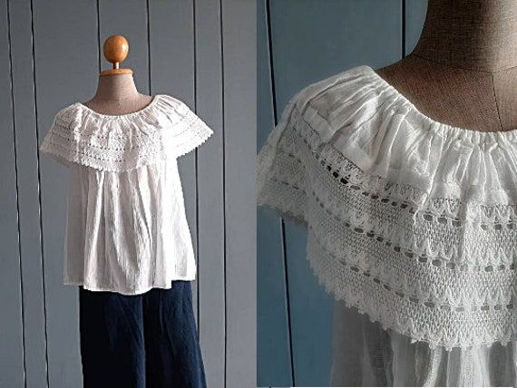 "Vintage lace blouse White cotton Classic Very lightweight Great for summer In Measurements(taken flat): Shoulders: free Bust: 18\" - 19\" Waistline : 24\" Total Length: 22\" Best fits Size M Excellent vintage condition. Pre-own but no flaws to note. Shipping includes price for a tracking number! To see more items, visit : www.etsy.com/shop/RetroTheory" Silk Harem Pants, Vintage White Blouse, Vintage Lace Blouses, Maternity Dresses Summer, Cotton Shirts Women, Blouse Summer, Blouse Lace, White Lace Blouse, Summer Blouse