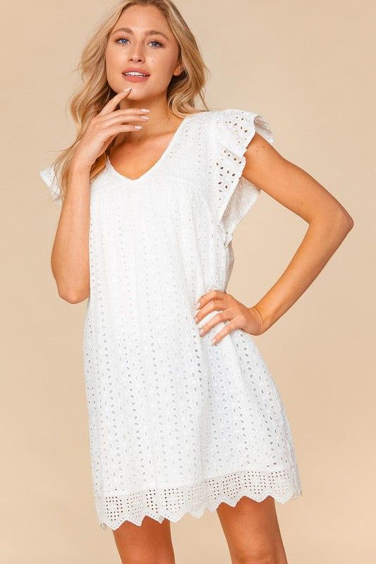 Calling all brides! This off-white, eyelet embroidered cotton dress is a must have! We love the short sleeves with ruffle details, keyhole button back, and crochet lace hem - This midi dress has it all! Add your favorite heels to complete this dressy look! Dress is fully lined Model is 5'7 and wearing a small 100% Cotton Short Sleeve Eyelet Dress For Brunch, Eyelet Short Sleeve Dresses For Brunch, Summer Dresses With Broderie Anglaise And Flutter Sleeves, Short Sleeve Eyelet Dresses For The Beach, White Cap Sleeve Casual Dress, Casual Eyelet Dress With Short Sleeves, Summer Flutter Sleeve Dresses With Broderie Anglaise, White Cap Sleeve Summer Dress, White Casual Cap Sleeve Dress