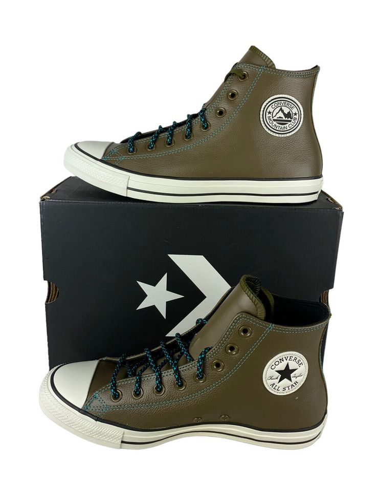 One pair of new in box adult unisex Converse Chuck Taylor All Star Hi Mountain Club Shoes/Sneakers (165957C). The color is Surplus Olive/Turbo Green/Egret, and the size is men's US 9 (fits women's US 11) (UK 9, EUR 42.5, CM 27.5). Specifications: Leather material upper Converse Mountain Club logo on outer ankle Converse Chuck Taylor All Star logo on outer ankle Egret colored outsole with black striping Converse All Star logo on back heel Black bottom  Extra set of rope laces  Shipping: We ship all items within 24 hours excluding weekends and bank recognized holidays. Returns: We accept domestic returns for this item within 30 days. New items returned in used condition will not be accepted. Questions? Feel free to message us. We will return your message promptly. Looking for more discounted Waterproof Brown Low-top Sneakers, Leather Sneakers With Vulcanized Sole For Outdoor Activities, Green Converse High-top Sneakers For Outdoor, Green Converse Sneakers For Outdoor, Green Waterproof High-top Sneakers, Green Leather Converse Sneakers, Brown High-top Waterproof Sneakers, Leather Sneakers With Rubber Toe Cap For Outdoor, Leather Sneakers With Rubber Toe Cap For Outdoor Activities