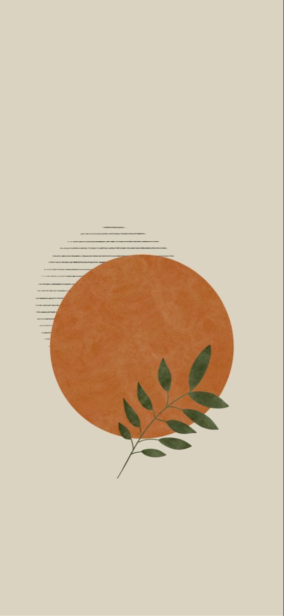 an orange circle with some green leaves on it