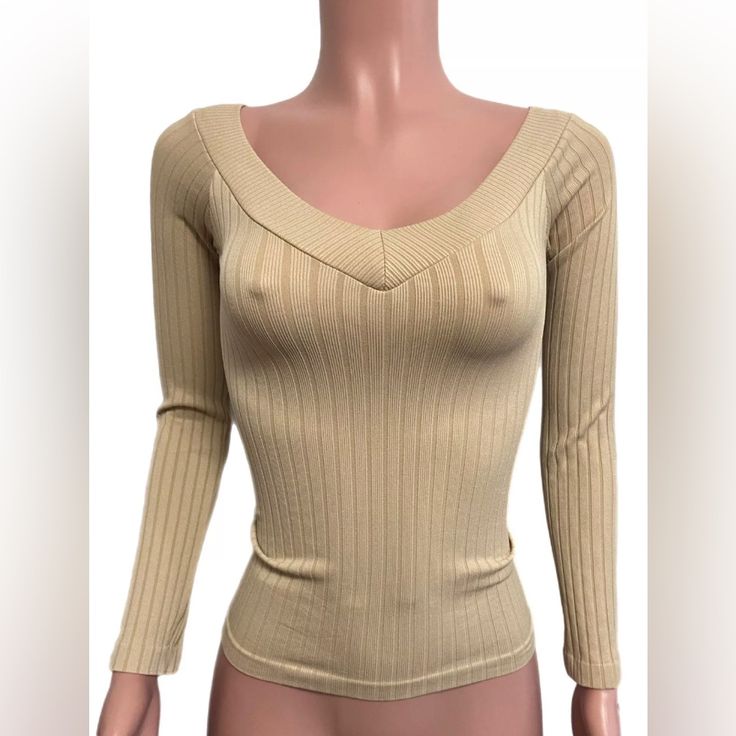 Beige Seamless Ribbed Fitted Stretchy Long Sleeve Off Shoulder Top Nwt O/S. Condition Is New With Tags. Fabric Is Nylon Spandex . Stretchy And Fitted. One Size Fits Xsmall To Medium Best . Nice Fabric And Well Made. Seamless V-neck Knit Top For Fall, Stretch Seamless V-neck Knit Top, Stretch Ribbed V-neck Sweater, Beige Ribbed V-neck Top, Stretch Ribbed Knit Top With V-neck, Seamless V-neck Tops For Fall, Seamless V-neck Fall Top, Fall Seamless V-neck Top, Seamless Stretch V-neck Knit Top