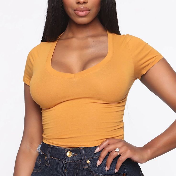 Fashion Nova’s “Carly” V Neck Crop Tee - Mustard Nwt, In Pkg Product Details: Short Sleeve Tee V Neck Cropped Stretch 95% Cotton 5% Spandex Imported Notes: Fit - True To Size Reviews What People Are Saving On Fashionnova.Com “Nice Everyday. Can Wear It W Anything.” “Love It. Fits Well.” “Lovely. It Fits Great And Would Purchase More In Other Colors.” Leave A Comment If You Have Any Questions! Make Offers!! Orange Stretch V-neck Top, Stretch Orange V-neck Top, Orange Stretch Crop Top With Short Sleeves, Trendy Orange Short Sleeve Crop Top, Orange Short Sleeve Crop Top, Trendy Orange Short Sleeve Top, Trendy Stretch Orange T-shirt, Orange Stretch Cotton Tops, Raven Tracy