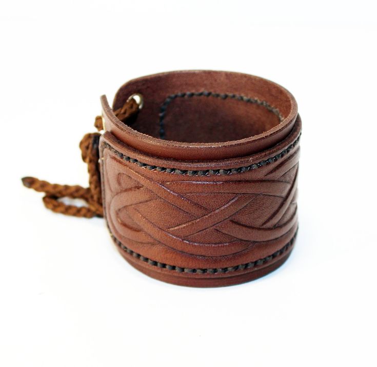 Handmade Viking Leather Bracelet For Gifts, Handmade Viking Leather Bracelet Gift, Adjustable Traditional Leather Bracelet, Brown Leather Bracelet With Wrist Strap For Festivals, Adjustable Hand Tooled Leather Cuff Bracelet, Adjustable Brown Hand-stitched Cuff Bracelet, Adjustable Hand-stitched Bracelet For Gift, Adjustable Leather Viking Bracelet, Adjustable Viking Leather Bracelet