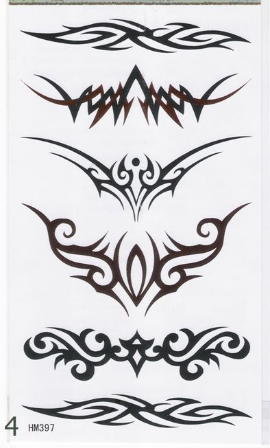 an image of tattoos on the back of a sheet of white paper with brown and black designs