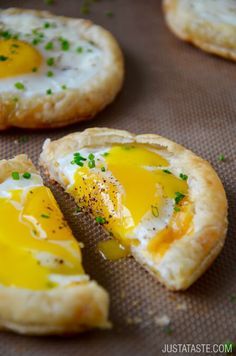 an egg pie is cut in half on a baking sheet