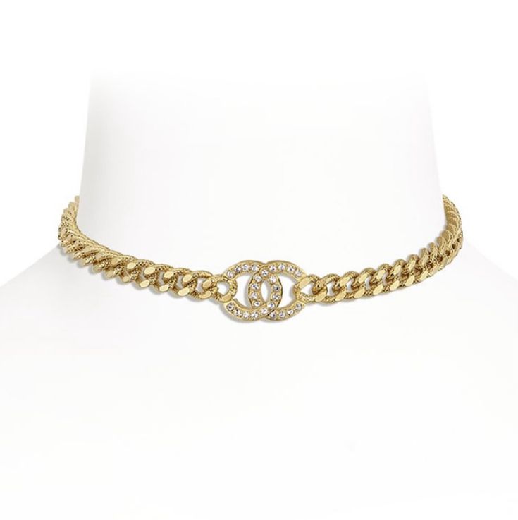 Chanel REV Gold Golden Cuban Link Chain Crystal CC Logo Choker Pendant Necklace ********** Chanel ********** Brand: Chanel Size: Adjustable Name: Cuban Color: Gold & Crystal Style: Choker Necklace Season: REV Style#: AB8930 B08685 NJ336 Material: Metal Crystal CC interlocking logo Thick cuban link like gold chain Adjustable chain back with CC drop SOLD OUT WORLDWIDE, EXTREMELY RARE Brand new in box, with tags and dust bag, full set 100% Authentic or your money back Great gift I ship worldwide Any other questions just ask, I will be happy to answer them Luxury Metal Chain Necklace With Logo Charm, Designer Chain Necklace As Gift, Designer Pendant Chain Jewelry, Designer Yellow Gold Metal Necklaces, Designer Yellow Gold Metal Necklace, Designer Clavicle Chain Necklace, Designer Yellow Gold Necklace, Elegant Gold-tone Chain Necklace With Logo Charm, Designer Gold Jewelry With Adjustable Chain