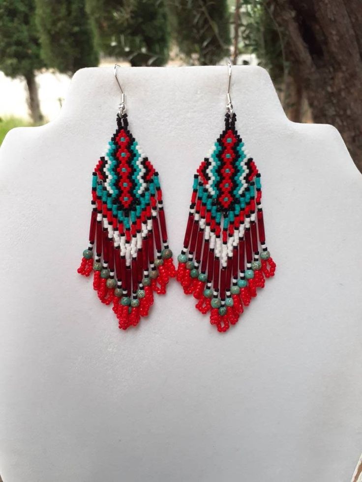 Beautiful Native American Style Beaded Rug Earrings in Black, White, Red and Turquoise. They are 4 inch long and 1 inch wide, with Twisted Red Glass Bugle Beads on them. If you like these but would like other Colors just email me.Thanks for looking. Red Bohemian Beaded Fringe Jewelry, Red Bohemian Jewelry With Beaded Fringe, Adjustable Red Beaded Fringe Earrings, Southwestern Red Earrings With Colorful Beads, Traditional Red Beaded Fringe Jewelry, Red Southwestern Dangle Earrings, Red Southwestern Style Earrings For Festivals, Southwestern Red Dangle Earrings, Southwestern Style Red Dangle Earrings