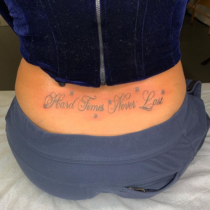 a woman's stomach with the words, hard times mom last written on it