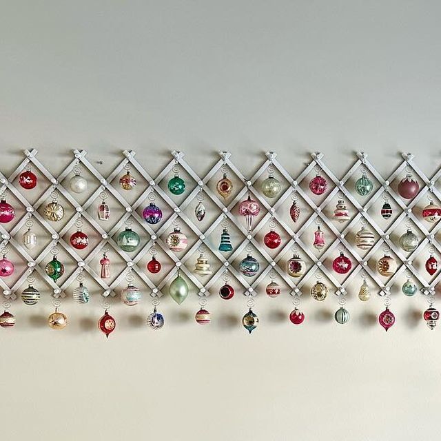 a wall with ornaments hanging from it's sides