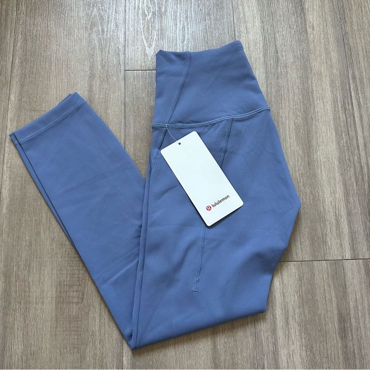 Lululemon Wunder Train Hr Tight 23” *Pockets - Water Drop New With Tags Blue Athleisure Activewear With Functional Pockets, Functional Blue Activewear With Pockets, Blue Yoga Activewear With Side Pockets, Blue Activewear With Side Pockets For Yoga, Blue Activewear With Pockets For Gym, Blue Activewear With Side Pockets For Workout, Blue Gym Activewear With Pockets, Blue Workout Activewear With Side Pockets, Blue Yoga Pants With Pockets