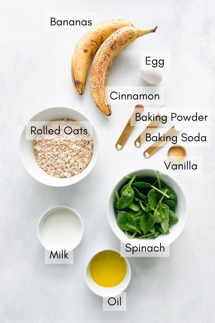 ingredients to make banana oatmeal recipe laid out on a white table top