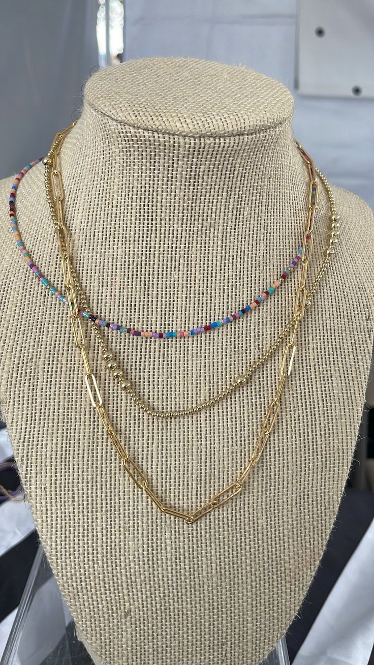 14k gold filled beaded necklace, which means it doesn't tarnish 2mm and 4mm beads mixed together Choose length Materials made in the USA then assembled in our MS studio Gold Jewelry With Colorful Beads For Layering, Multicolor Tiny Beads 14k Gold Filled Jewelry, Adjustable Gold Layered Necklace With Round Beads, 14k Gold Filled Multicolor Tiny Beads Jewelry, Gold Beaded Necklaces With Colorful Beads For Everyday, Gold Beaded Necklaces For Layering, Gold Beaded Everyday Chain Necklace, Gold Chain Necklace With Colorful Beads, Gold Jewelry With Colorful Beads For Everyday