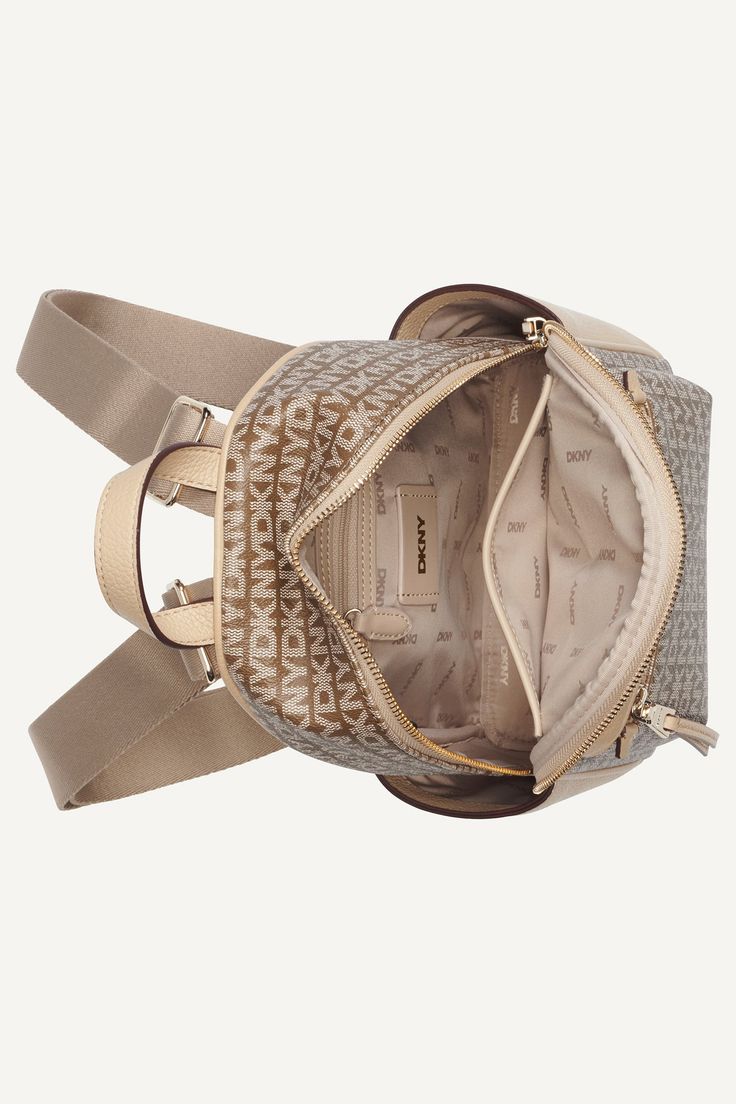 Zipper closure Gold hardware Adjustable straps Interior and exterior pockets DKNY logo detail 10" L x 10" H x 6" D 100% Polyester Trim: 51% Recycled Polyester, 49% Polyurethane Origins: Imported Style: R42K5D02 | DKNY Women's Zoie Mini Backpack in Beige