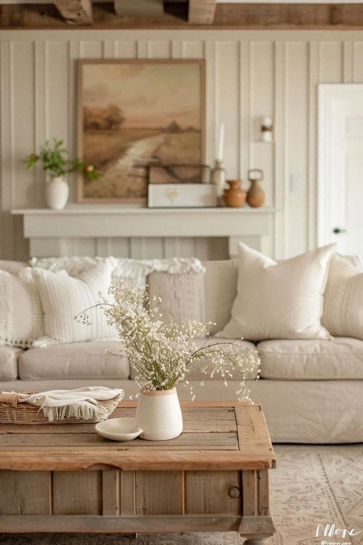 a living room filled with furniture and a coffee table