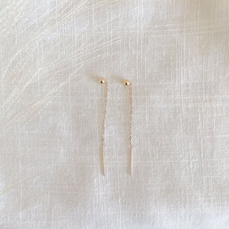 14k gold filled ball ear threaders Length: 1.2" total threader length Sold as a pair Please note: all earrings are final sale Everyday 14k Gold Filled Nickel Free Threader Earrings, Dainty 14k Gold Filled Linear Earrings For Everyday, Minimalist 14k Gold Filled Nickel-free Threader Earrings, Minimalist Nickel-free 14k Gold Filled Threader Earrings, Minimalist Nickel-free 14k Gold-filled Threader Earrings, Everyday Hypoallergenic 14k Gold Filled Threader Earrings, Gold Dangle Ear Climbers, Minimalist 14k Gold Filled Linear Earrings, Dainty 14k Gold Long Drop Linear Earrings