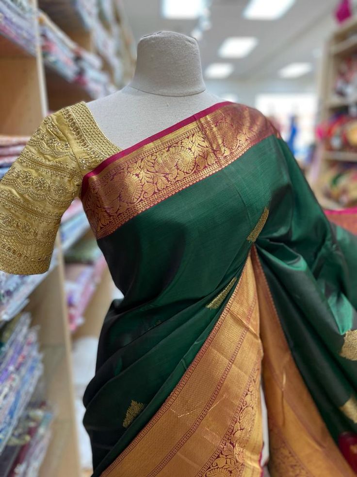 Envelope yourself in the beauty of this exquisite Kanjeevaram Silk Saree NK- 014. Crafted from the finest silk, this saree exudes luxury and sophistication. Feel the natural texture of this gorgeous piece as you make a statement at your next special occasion. Ready to Ship! Paithani Silk Traditional Wear For Puja With Tilla Detailing, Paithani Silk Traditional Wear With Tilla For Puja, Elegant Lehenga For Puja And Navratri, Traditional Pre-draped Tilla Saree For Festivals, Traditional Tilla Lehenga In Paithani Silk, Festive Paithani Silk Traditional Wear With Tilla Details, Traditional Paithani Silk Lehenga With Tilla, Traditional Semi-stitched Saree With Tilla, Festive Paithani Silk Traditional Wear With Tilla