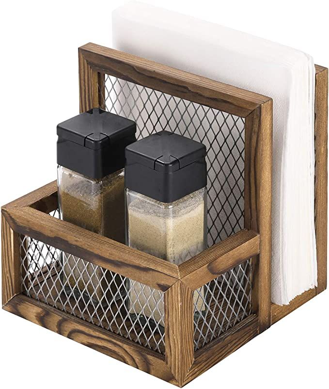 a wooden holder with spices and napkins in it