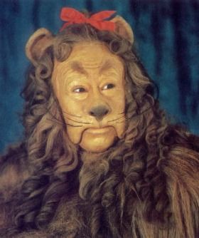 an image of a man with long hair and a bear mask on it's face