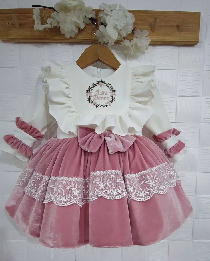 NOTE Please visit my shop for many other kids costumes and outfits. https://www.etsy.com/shop/SammysCostumes/?etsrc=sdt This personalized girls velvet and cotton 1st birthday dress is handmade to order. This birthday party dress is made of high quality fabrics of Cotton and Velvet fabric and monogrammed with name and date. Little Girls and Toddlers dress is perfect for any formal occasion. Little girls birthday outfit.   Includes Free Embroidered Hair Piece From Infant 3 6 9 months to 8 Years Old Sizes Available  You can contact Us with Different Color Requests    You can purchase matching shoes for age 1 and 2 Storybook Fairytale Girls Birthday Party Dress Custom Made Girls Toddlers 1st Birthday Dress Quality Fabric and Workmanship Cotton with high quality Velvet Free Embroidery for Birth Princess Style Dress With Ruffles For First Birthday, Cute Ruffled Princess Dress For Birthday, Cute Princess Dress With Ruffles For Birthday, Sweet White Princess Dress For First Birthday, Sweet White Princess Dress For Birthday, Christmas Princess Dress With Ruffles For Baptism, Christmas Baptism Princess Dress With Ruffles, Pink Ruffled Dresses For Costumes, Pink Ruffled Dress For Costume