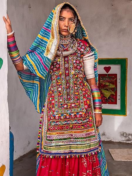 A traditional style of blouse (kanchli or choli) from the Banjara nomadic tribe of Rajasthan. Multicolor Bohemian Traditional Wear For Festivals, Bohemian Multicolor Traditional Wear For Festivals, Transitional Multicolor Traditional Wear With Embroidered Border, Traditional Multicolor Choli For Festivals, Bohemian Multicolor Traditional Wear With Pallu, Multicolor Bohemian Traditional Wear With Pallu, Bohemian Choli With Multicolor Embroidery And Pallu, Bohemian Traditional Wear For Navratri Festival, Bohemian Traditional Wear With Pallu For Festival