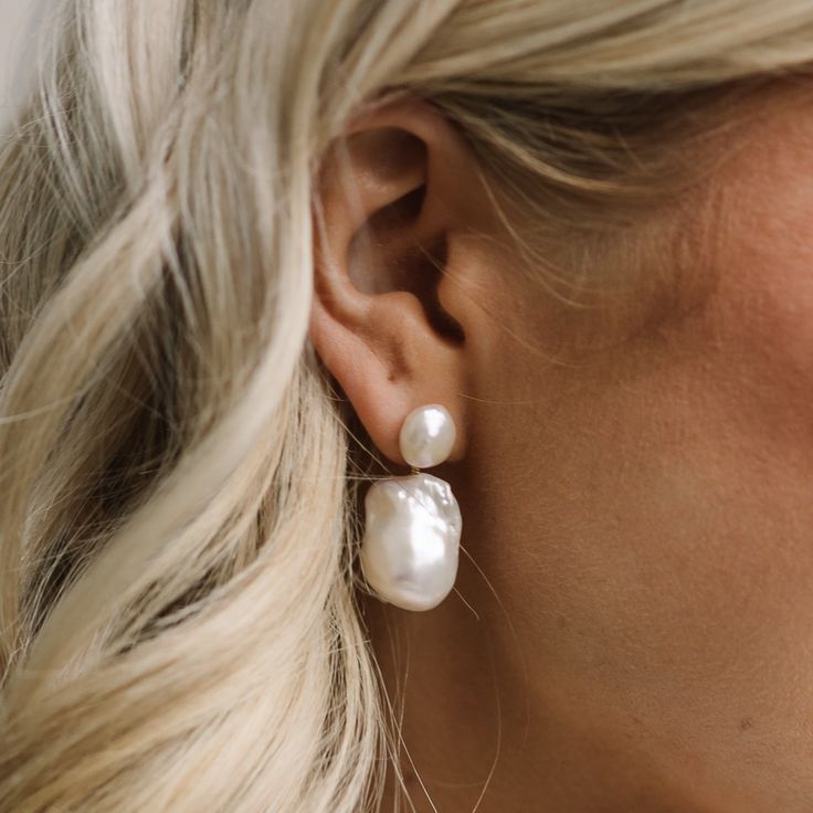 Made from beautifully baroque pearls, the Nova earrings are sure to make a luxurious statement for any event or wedding. The pearls have the most perfect shimmer and lustre to them while still providing a natural organic look through the unique baroque shape. These earrings have a detachable drop. The smaller top pearl can be worn alone as a simple pearl stud, for an everyday option. Two earrings in one! (see photo 5). Also available in sterling silver.  Gold-filled is a thick layer of carat gol Large Pearl Earrings, Pearl Statement Earrings, Top Pearl, Simple Pearl, Big Pearl, Bride Earrings, Gold Filled Earrings, Delicate Jewelry, Pearl Flower