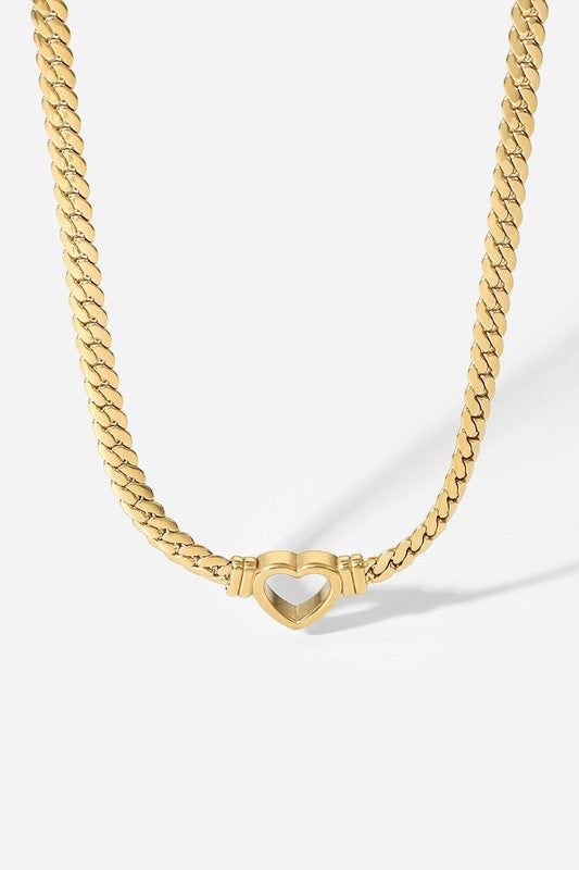 A beautifully crafted gold heart pendant necklace that goes with everything in your wardrobe. Worn alone or layered with other necklaces, this piece is a versatile addition to any outfit. Material: 18K Gold Plated Stainless Steel PVD Color: Gold Style: Pendant Necklace Clasps: Lobster Clasps Necklace Length: 16.73-19.88'' Heart-shaped Gold Chain Necklace, Trendy Heart Shaped Necklace With Gold Chain, Trendy Heart-shaped Gold Chain Necklace, Chic Metal Necklace For Valentine's Day, Valentine's Day Heart Pendant Necklace With Gold Chain, Heart-shaped Gold Plated Chain Necklace, Gold-tone Heart Chain Necklace, Gold-tone Gold Plated Heart Necklace, Heart-shaped Yellow Gold Plated Chain Necklace